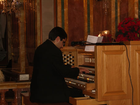 A5 Deacon Jos Curmi on the organ