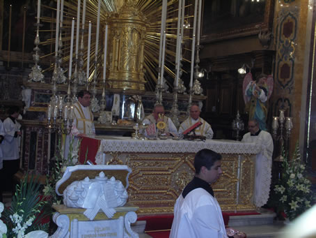 H2 Bishop receiving Holy Communion