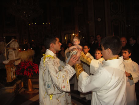 D2 Last student hands over Baby Jesus to Deacon Bajada