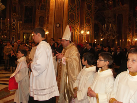 B4 Arch Mgr Carmelo Refalo walks to the High Altar