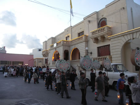 A4 Boys with placards and lanterns lead the procession