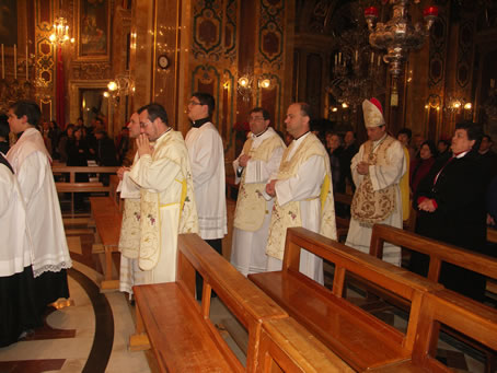 A4 Bishop Grech accompanied by co celebrants