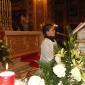 G3 Young altar boy recites prayers during adoration