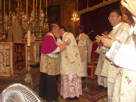 D3 Archpriest embraces preacher