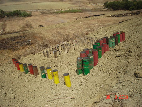 A6 iron and cardboard tubes embedded in the soil