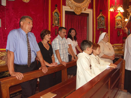 D8 The new altar boys and their parents