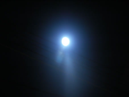 I1 Outside, a bright moon lights the calm night