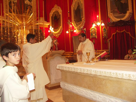 C8 Deacon incensing the celebrant