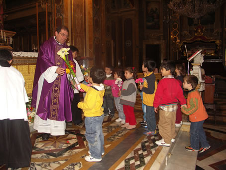 C3 The very young offering flowers