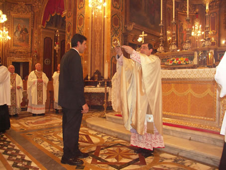 A8 Archpriest presenting it to the Congregation