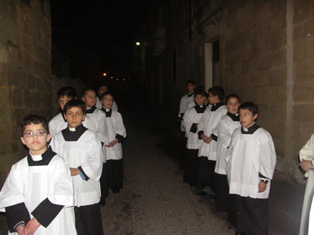 E4 The altar boys leading the pilgrimage