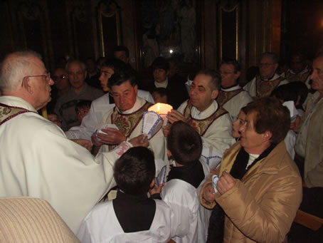 B5 Clergy light their candles