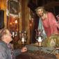 D9 A devotee prays in front of the statue of the Redeemer