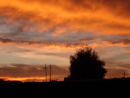 The sun sertting down over Xaghra